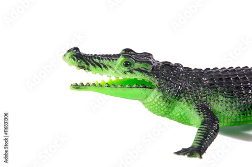 Green plastic crocodile isolated on white background.Plastic cro