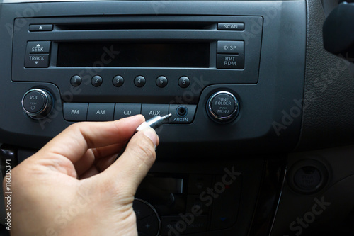 man hand use the signal switch. Car interior detail