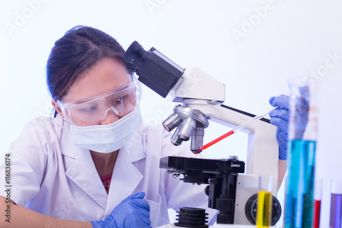 Laboratory microscope research. Scientist people study and anlaysis in lab room. photo