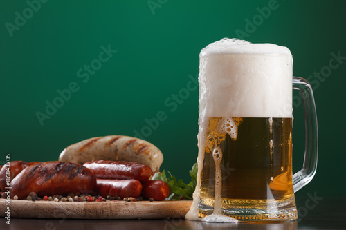 Grilled sausages with glass...
