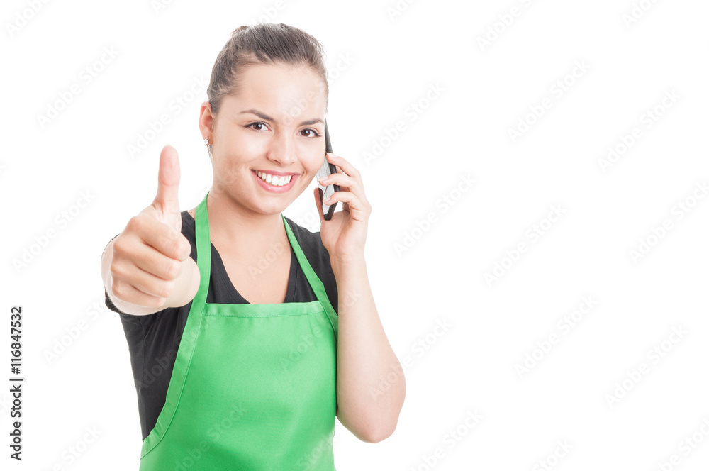 Smiling attractive employee calling somebody