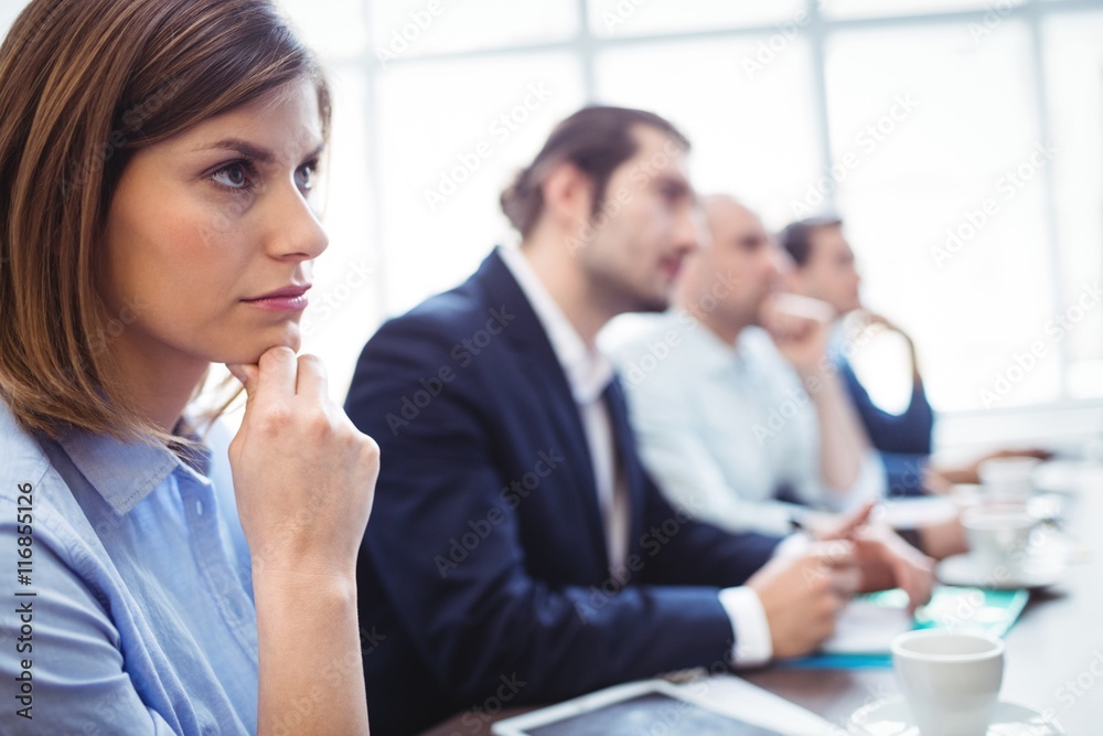 Obraz premium Businesswoman with colleagues during meeting 