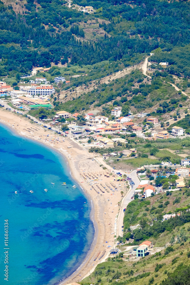 Corfu beach coastline birds eye view. Typical sandy beach found