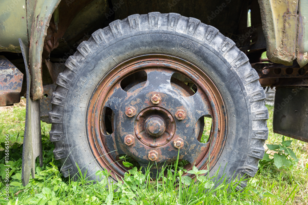 Close-up view of a wheel of an old soviet truck