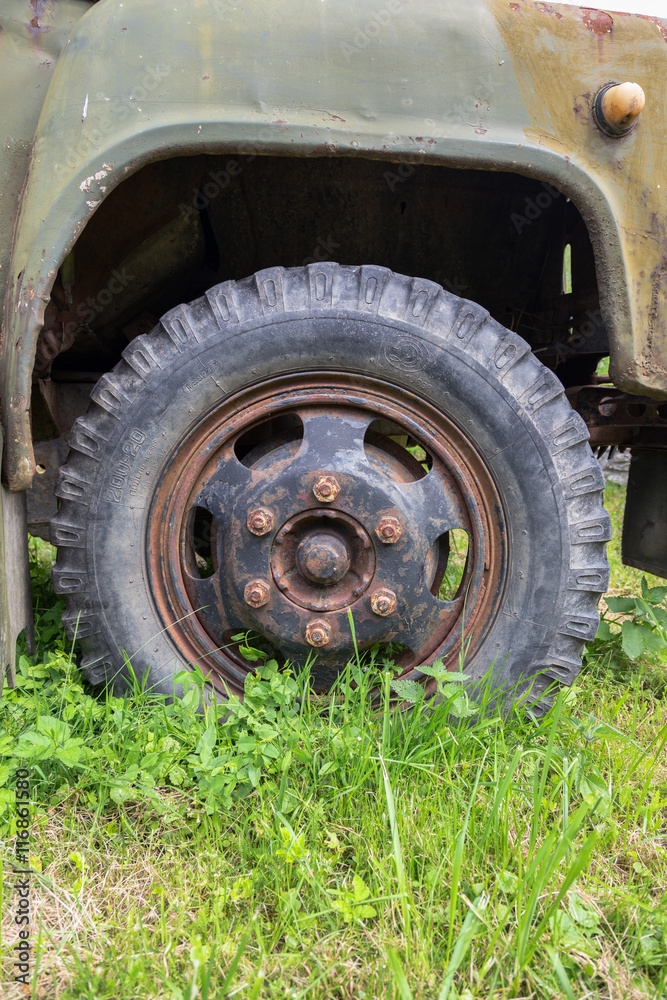 Close-up view of a wheel of an old soviet truck Close-up view of a wheel of an old soviet truck