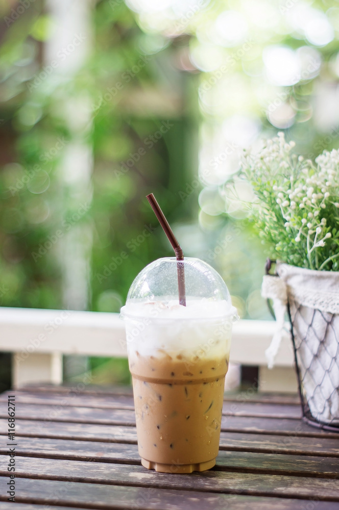 Iced coffee on the wood table. Iced coffee on the wood table.