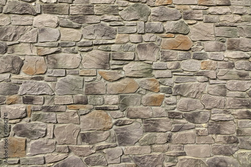 Modern Textured Stonewall Made From Flagstone And Sandstone Slab photo