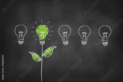 Green energy light bulb chalk board vector background