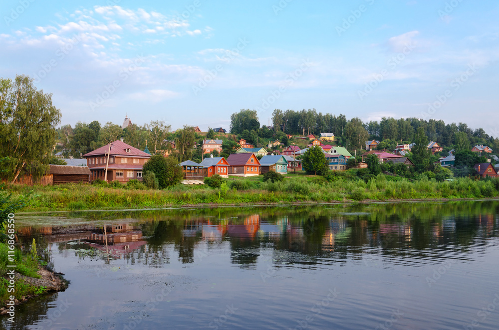 View of provincial town of Ples on shore of pond