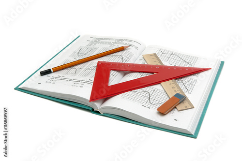 math book and office supplies on a white background
