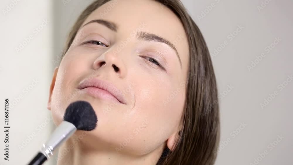 young beautiful perfect model applying professional makeup young beautiful perfect model applying professional makeup