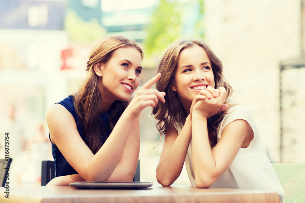 happy young women or teenage girls with tablet pc happy young women or teenage girls with tablet pc
