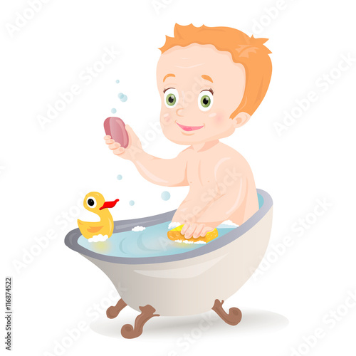 Cute baby boy smiling while talking a bath.