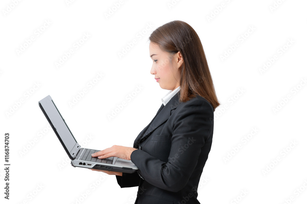 young business woman, standing wearing a white shirt and black s young business woman, standing wearing a white shirt and black s