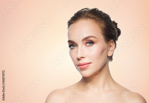 beautiful young woman face over white background