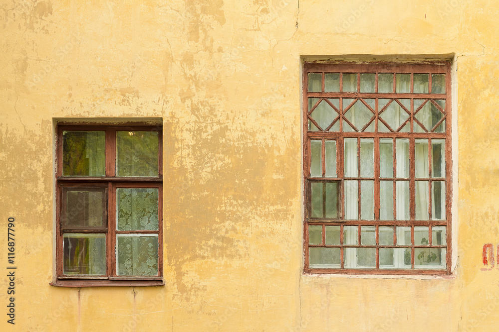 Big and small. The windows of the old house
