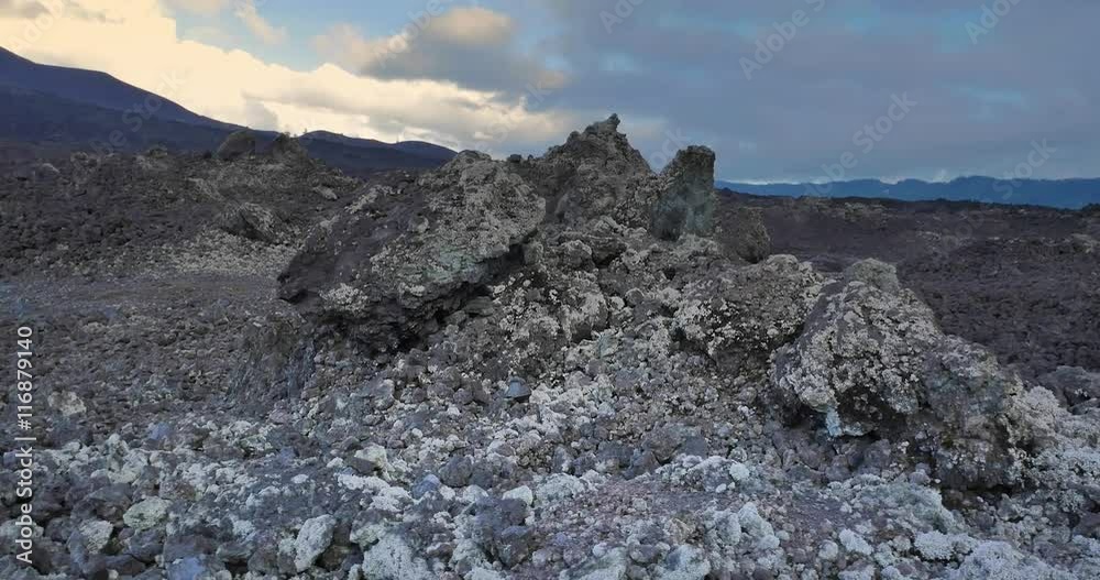 Scenic deserted rocky land of extreme nature volcanic terrain in volcano crater Scenic deserted rocky land of extreme nature volcanic terrain in volcano crater