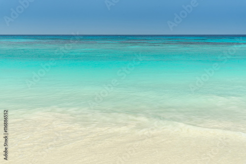 white beach, clear sea and blue sky © martinhosmat083