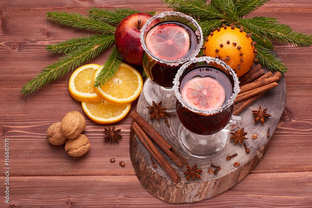 Glasses of mulled wine on wooden table Glasses of mulled wine on wooden table