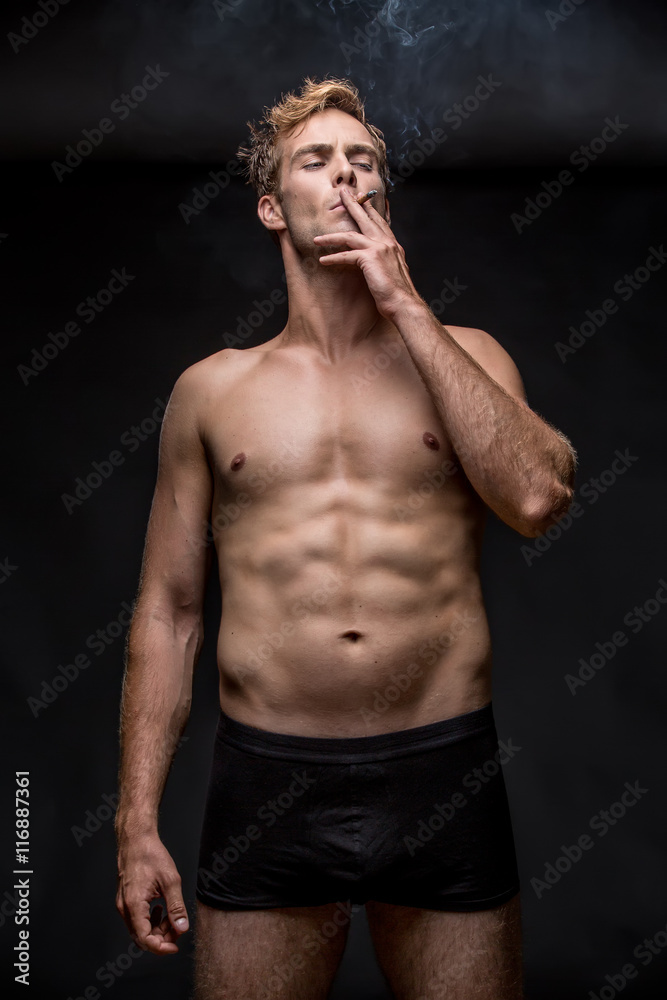 Smoking guy in underpants