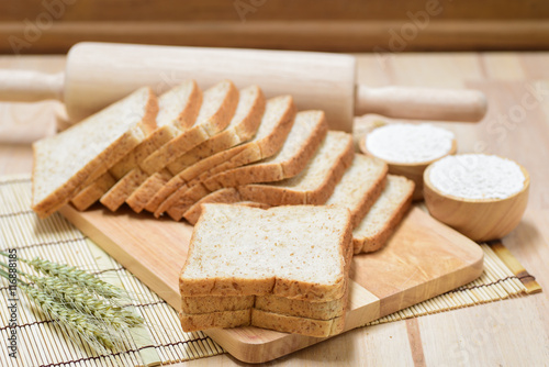 sliced bread on wooden table