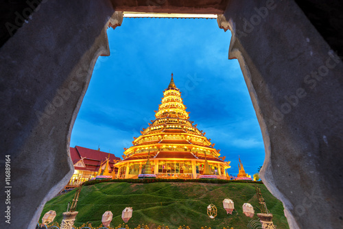 Golden Pagoda nine tier with dragon texture at Chinese temple - photo