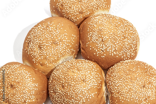Close Up of Sesame Seed Covered Golden Bread Rolls