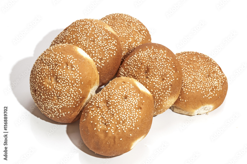 Six Golden Hamburger Rolls Covered with Sesame Seeds Six Golden Hamburger Rolls Covered with Sesame Seeds