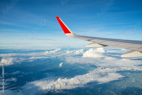 View of clouds and sky from a airplane window