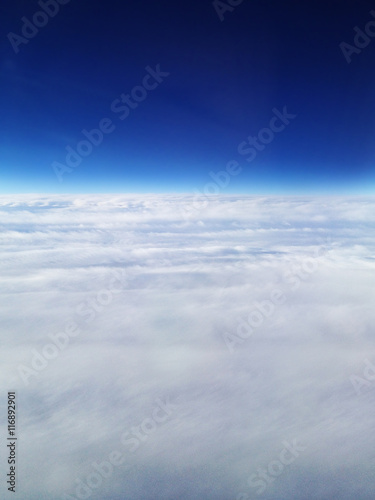 A view from above of a cloudscape and sky.