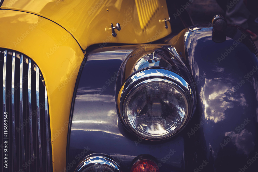 Vintage yellow and blue retro automobile