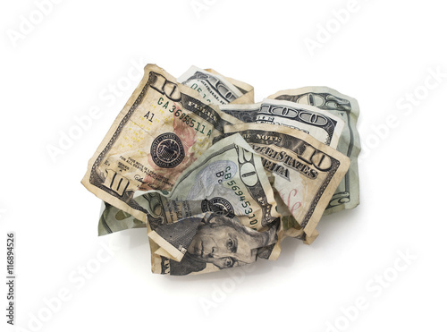 Isolated crumpled cash bills.