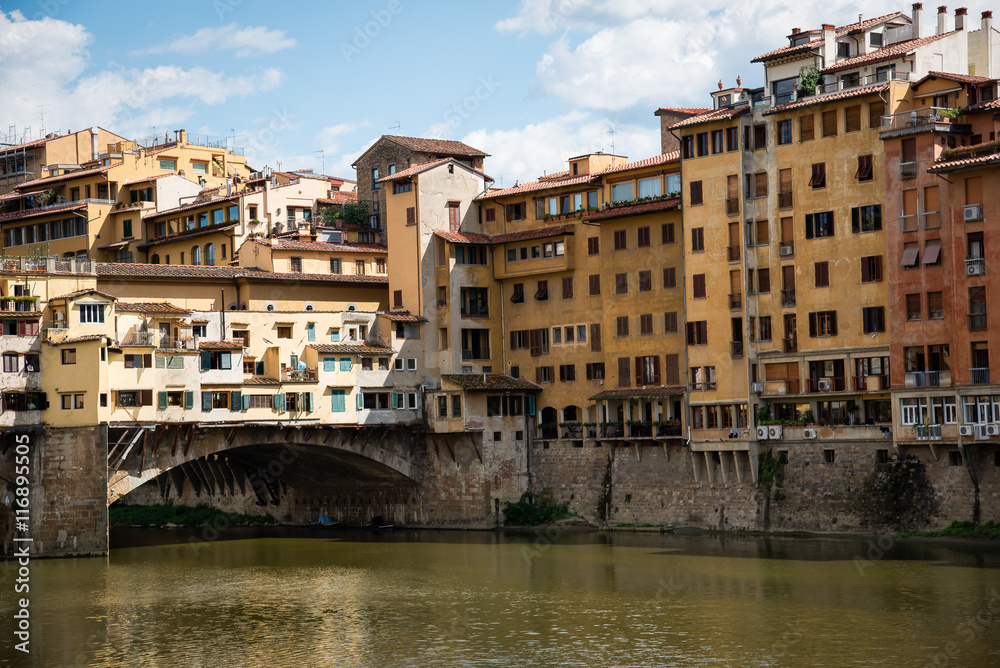 Ponte Vecchio over Arno river in Florence, Italy .