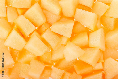 Cantaloupe melon chunks texture background