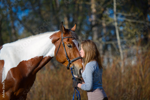 Girl sportswoman and her horse in the spring © sheikoevgeniya