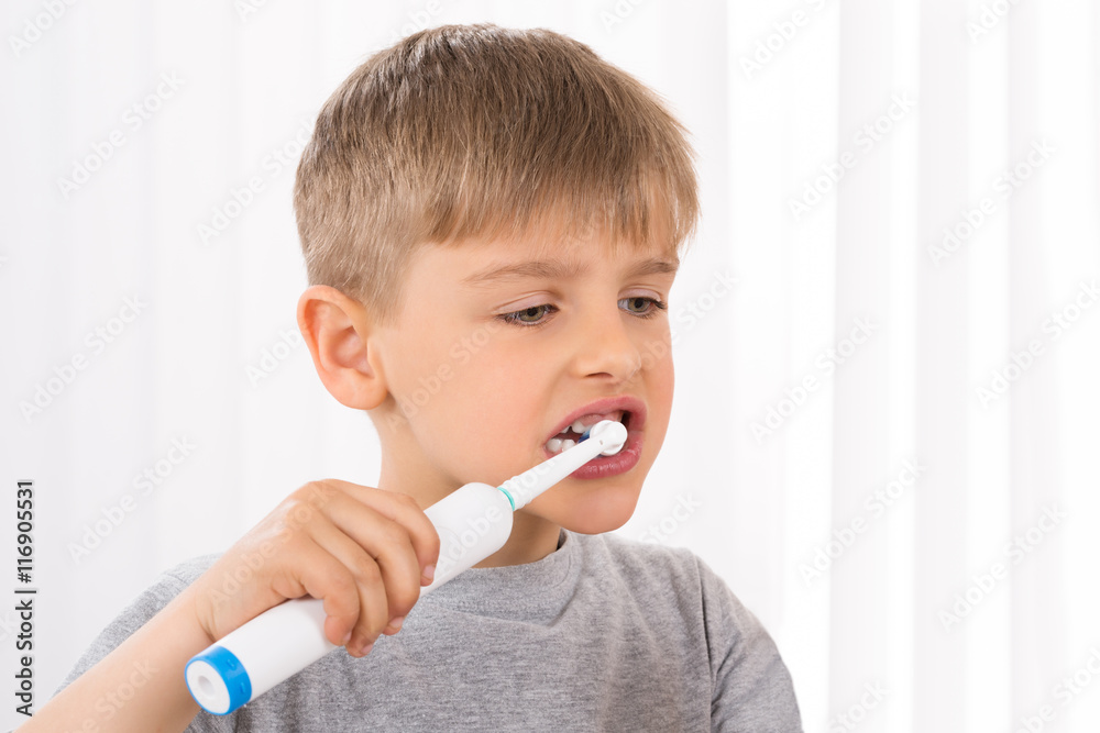 Close-up Of Boy Brushing Teeth Close-up Of Boy Brushing Teeth