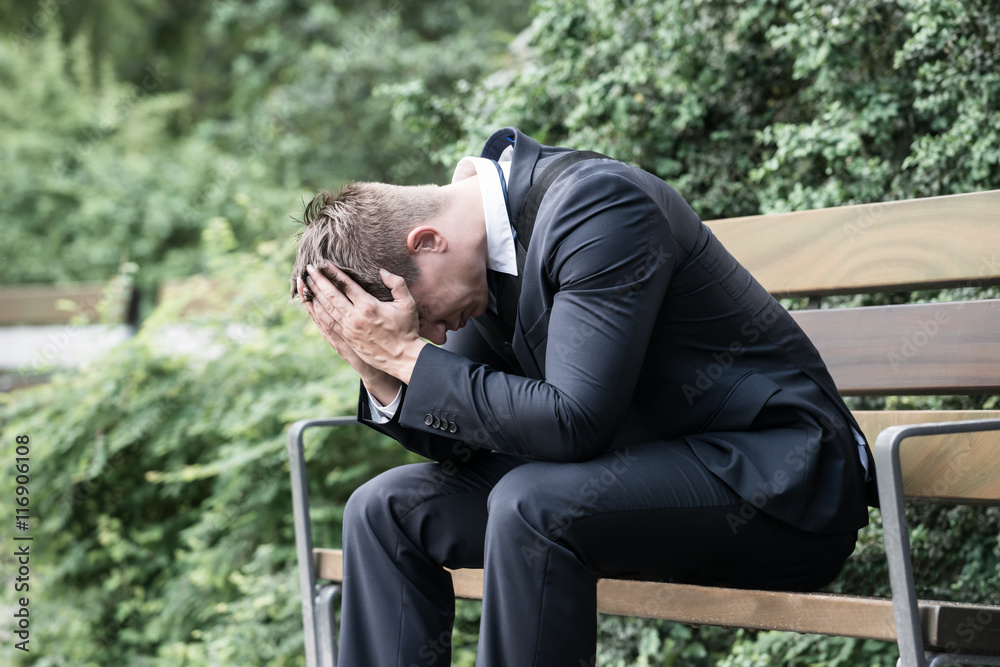Businessman Sitting On Bench Businessman Sitting On Bench