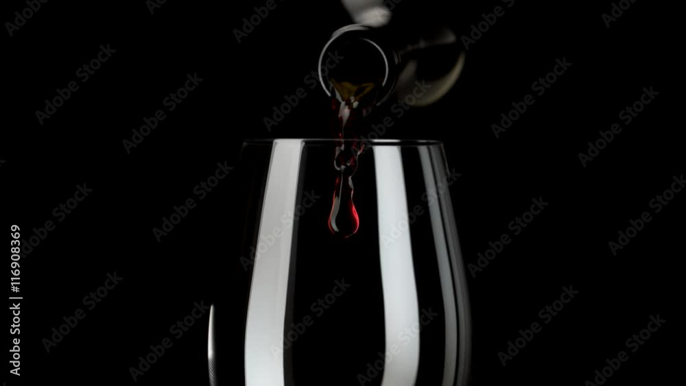 Camera follows red wine pouring into glass. Shot with high speed camera, phantom flex 4K. Slow Motion. 