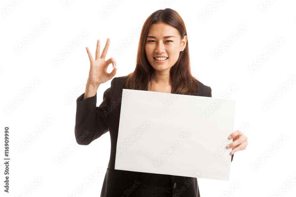 Young Asian business woman show OK with white blank sign. Young Asian business woman show OK with white blank sign.