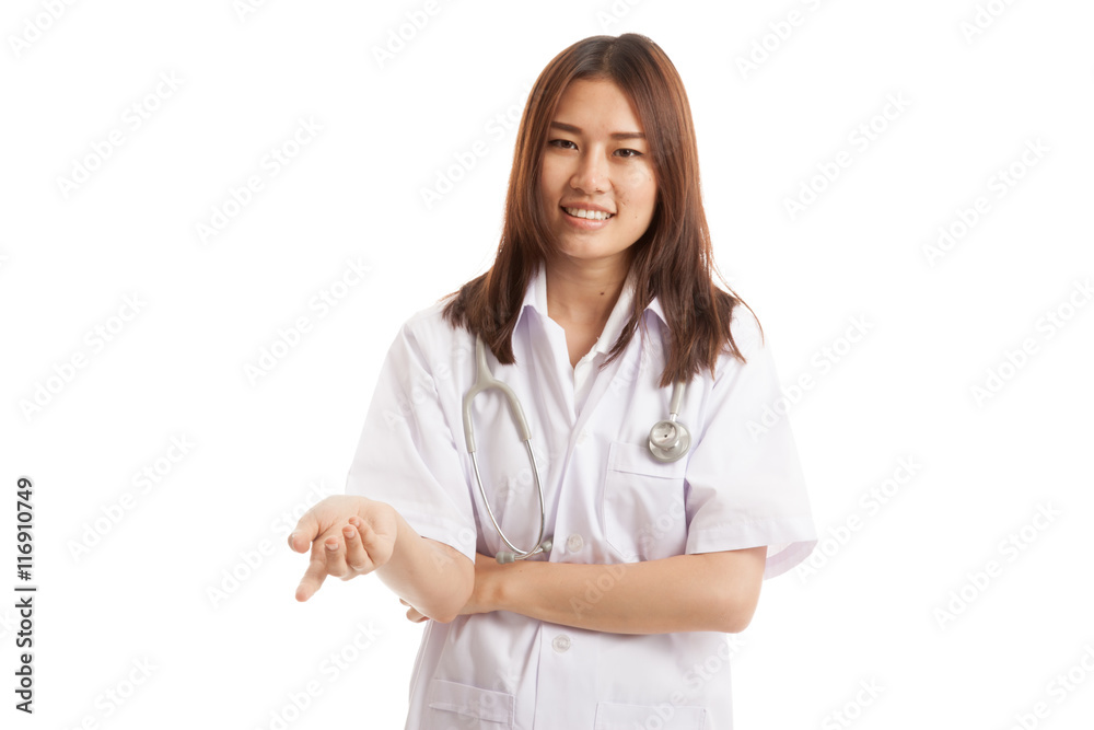 Asian young female doctor smile show her hand. Asian young female doctor smile show her hand.