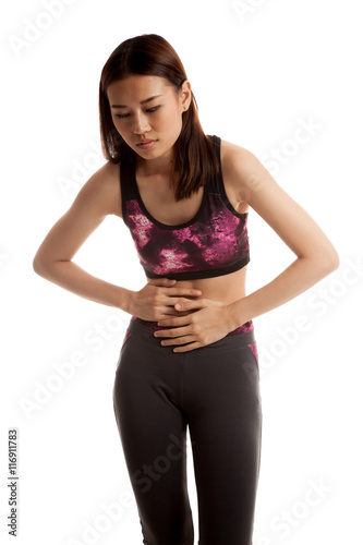Asian healthy girl got stomachache.