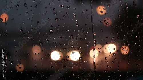 drop water on window with light car Traffic