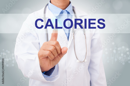 Doctor hand touching calories sign on virtual screen. healthy concept