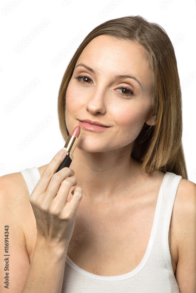 Portrait of beautiful young women applying blush. Portrait of beautiful young women applying blush.