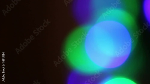 Flashing colored lights. Blurring background. photo