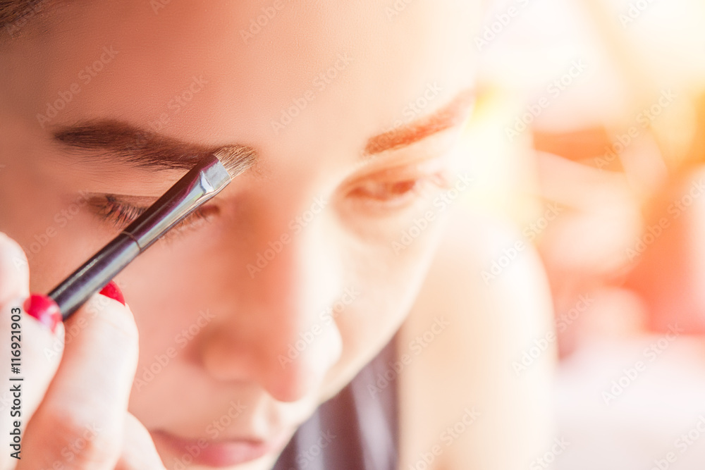 Eyebrow selective focus right eye and brush eyebrow Eyebrow selective focus right eye and brush eyebrow