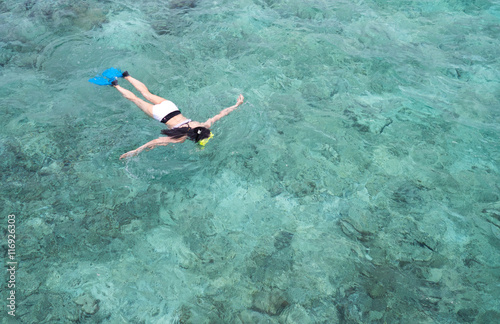 snorkeling on a blue clear ocean