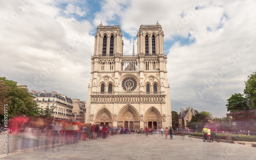 Notre Dame de Paris. France. Ancient catholic cathedral on the quay of a river Seine. Famous touristic architecture landmark in summer 