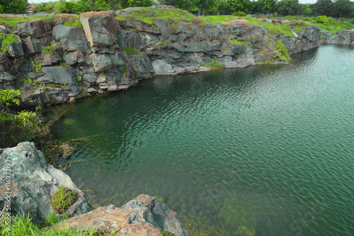 rocky lake with stone and cliff