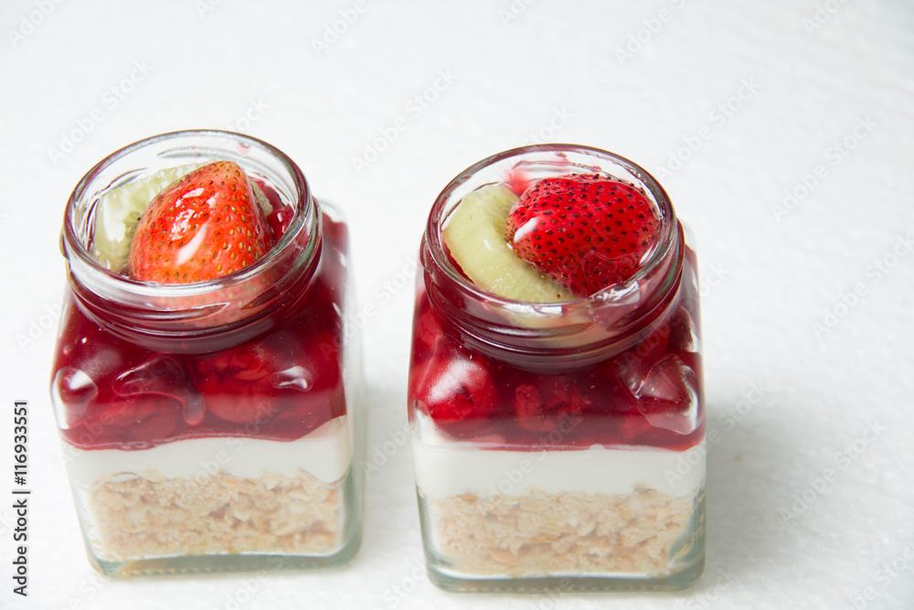 Dessert with cherry in glass bottle Dessert with cherry in glass bottle